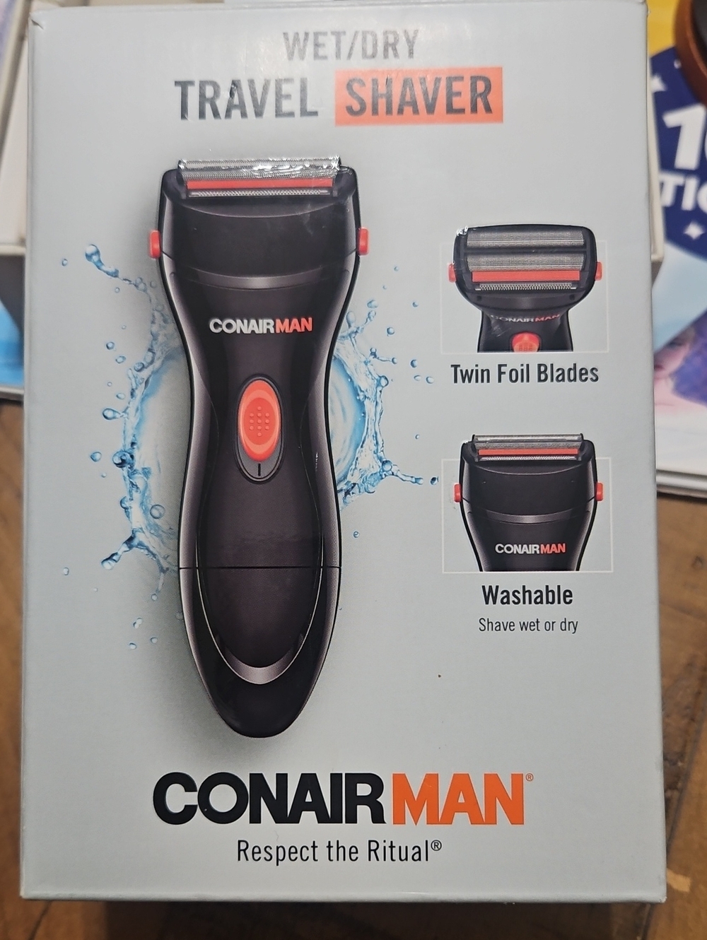ConairMan Wet/Dry Travel Shaver — Black with Orange Accents
